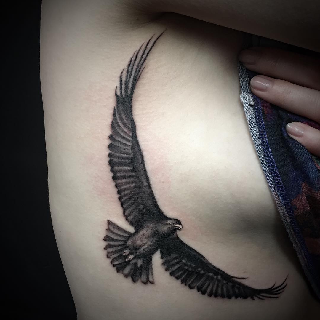 Dark Gray Beautiful Flying Eagle Tattoo On Girl Siderib