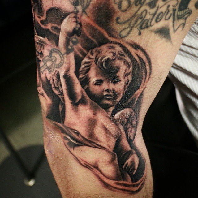 Fantastic Black & Grey Ink Angel Cherub Tattoo On Sleeve For Men