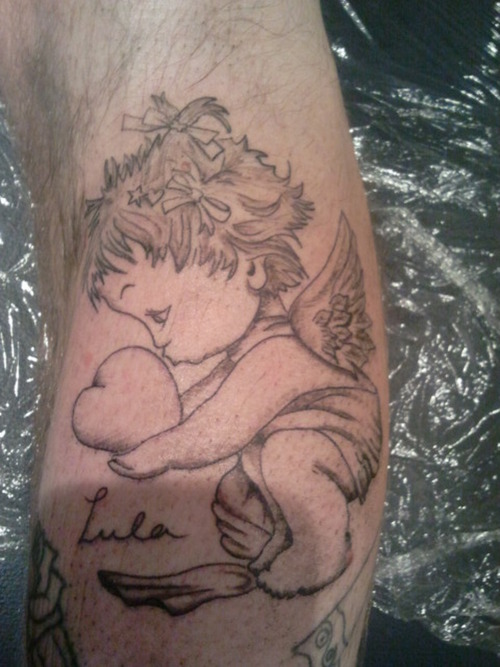Grey Ink Cute Cherub Kissing Heart Tattoo On Arm