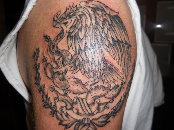 Grey Ink Eagle Vs. Snake Tattoo On Shoulder