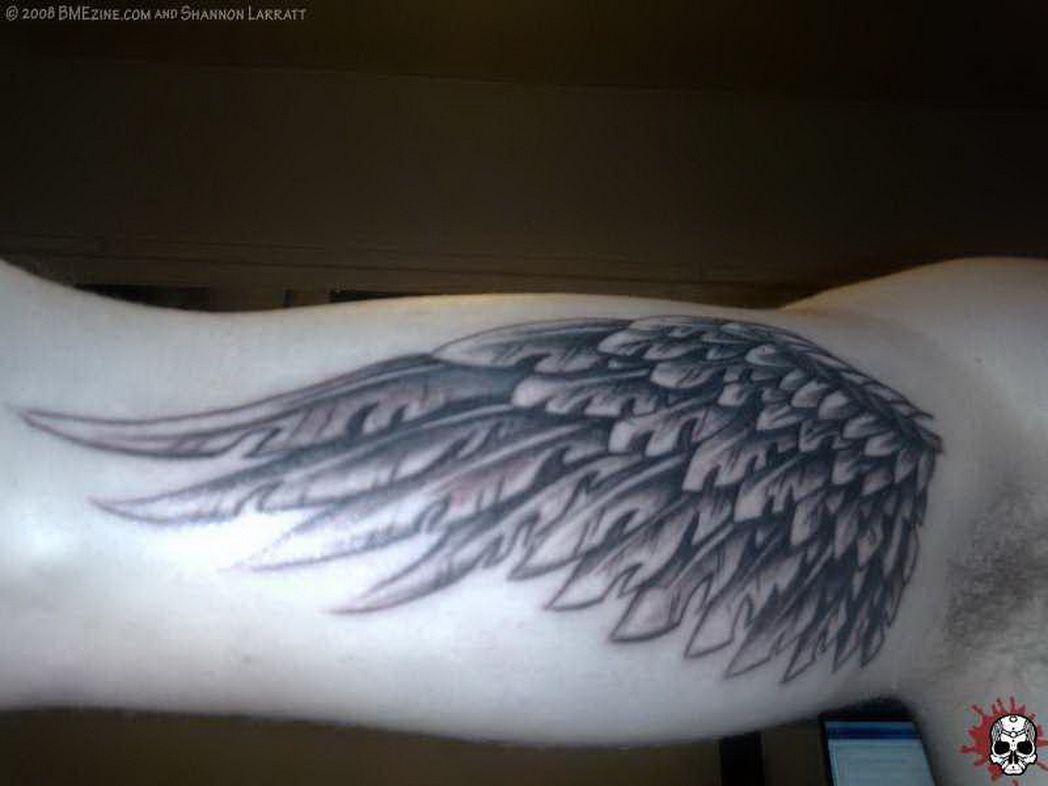Grey Ink Eagle Wing Tattoo Design On Bicep For Men