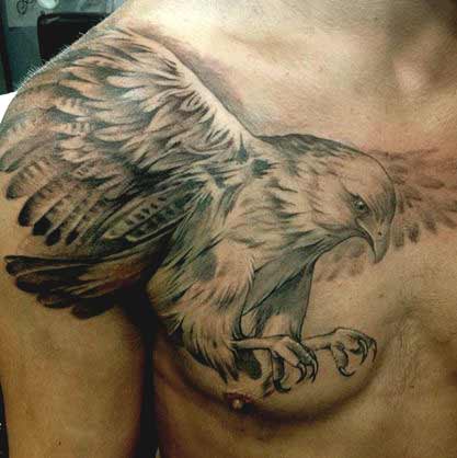 Grey Ink Elegant Flying Eagle Tattoo On Male Chest & Shoulder