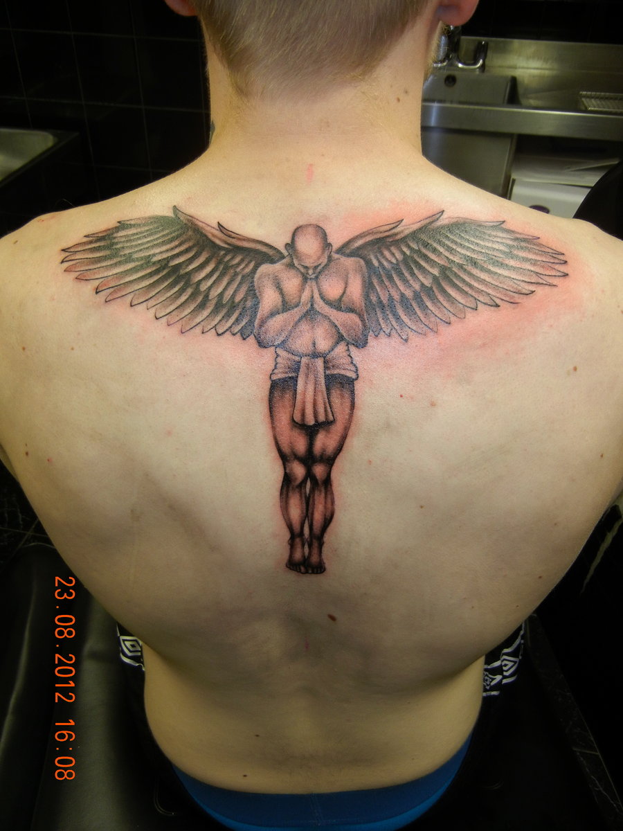 Grey Ink Praying Guardian Angel Tattoo On Upper Back