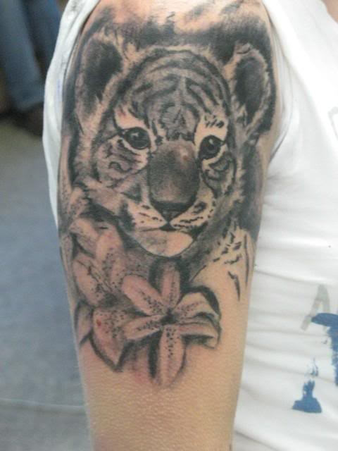 Grey Ink Realistic Baby Tiger Tattoo On Shoulder & Half Sleeve
