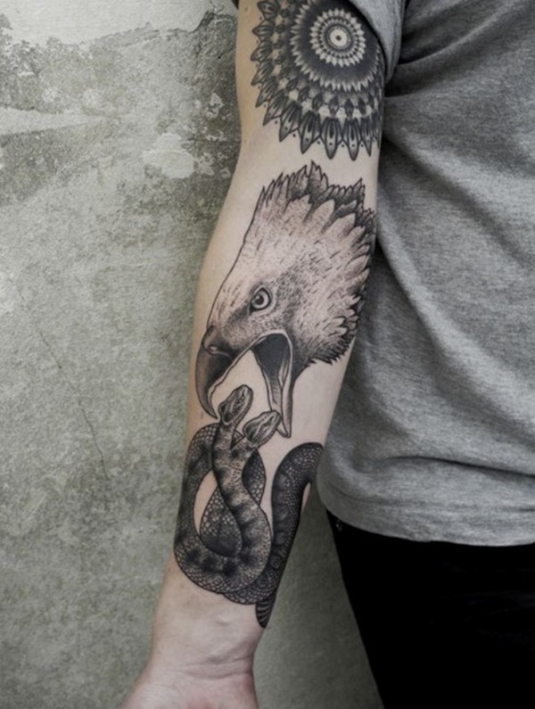 Grey Ink Realistic Eagle & Snake Tattoo On Forearm