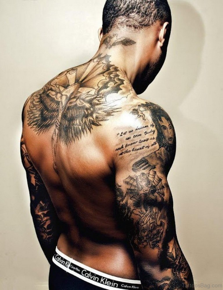 Impressive Black Ink Powerful Angel Tattoo On Back