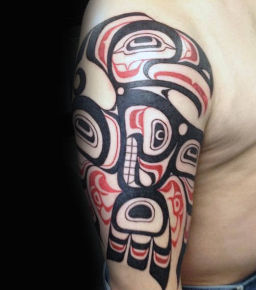 Powerful Haida Eagle Tattoo Design On Guy Half Sleeve