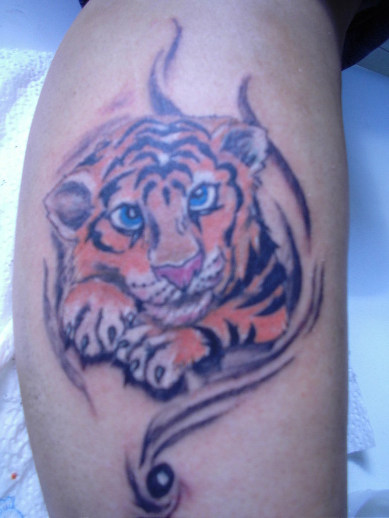 Ripped Skin Colorful Baby Tiger Tattoo On Arm