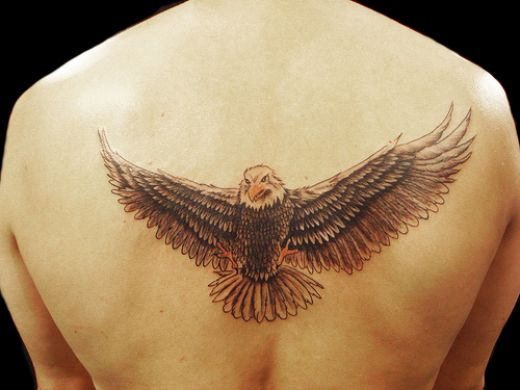 Simple Flying Bald Eagle Tattoo On Back