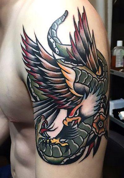 Traditional Eagle Vs. Snake Battle Tattoo On Male Half Sleeve