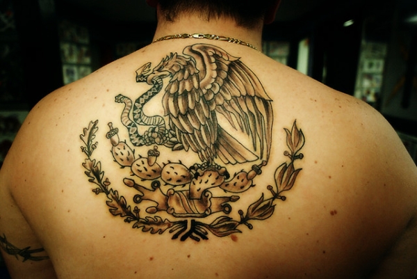 Unique Grey Ink Eagle & Snake Tattoo On Upper Back