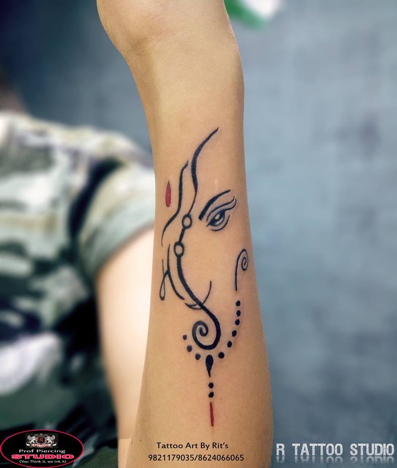 Maa with Ganpati Tattoo On Forearm