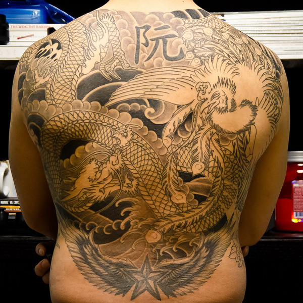 Amazing Black Ink Dragon & Phoenix Tattoo On Full Back For Men
