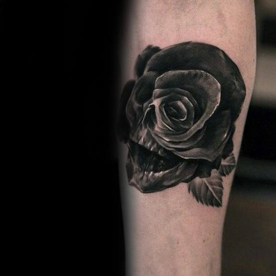 Amazing Black Ink Skull & Rose Composition Tattoo On Forearm