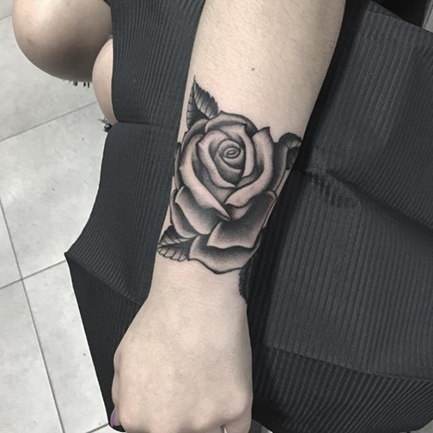 Amazing Black Rose Tattoo On Lower Outer Forearm