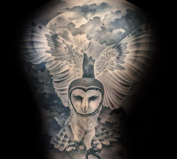 Amazing Grey & White Flying Barn Owl In Clouds Tattoo On Full Back