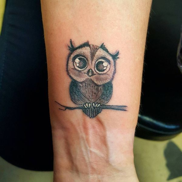 Black & Gray Ink Cute Sitting Owl Tattoo On Forearm