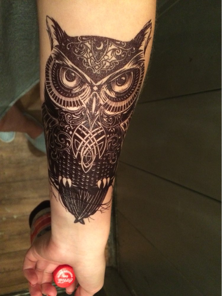 Black Ink Dark Celtic Owl Tattoo On Forearm