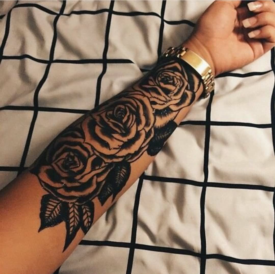 Black Ink Roses Tattoo On Male Forearm