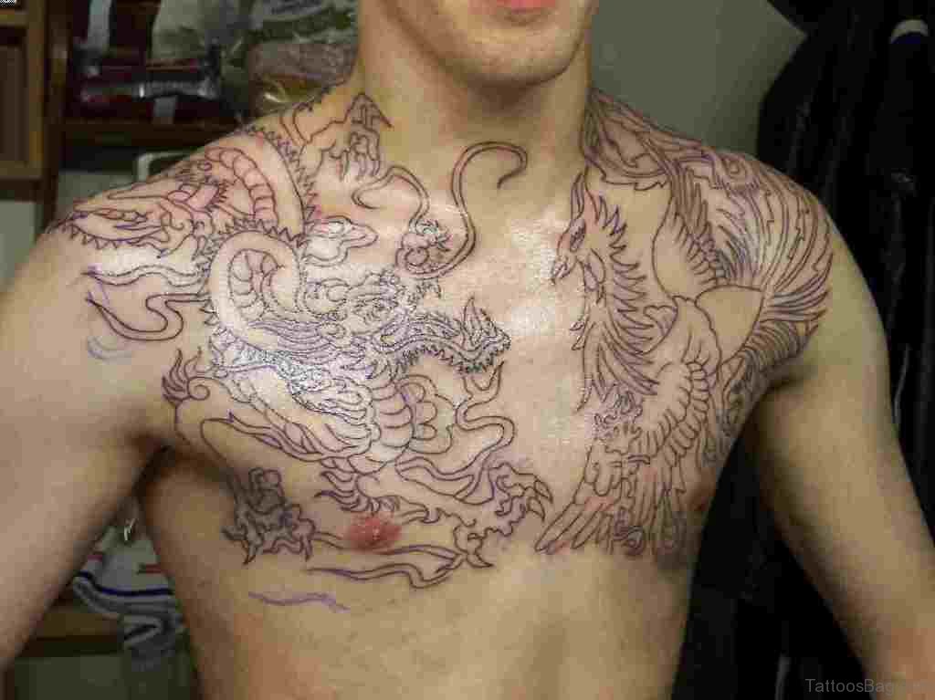 Black Outline Dragon Vs. Phoenix Tattoo On Male Chest
