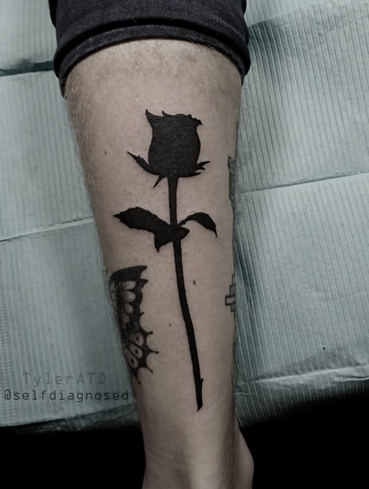 Black Silhouette Rose Tattoo On Forearm By Tyler ATD Tattoos , Whistler, Canada