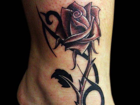 Charming Tribal Rose Tattoo On Foot