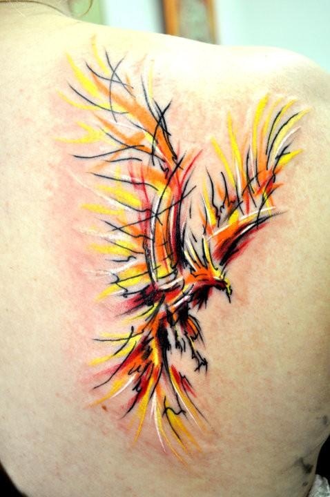 Colorful Artistic Flying Phoenix Tattoo On Back Shoulder