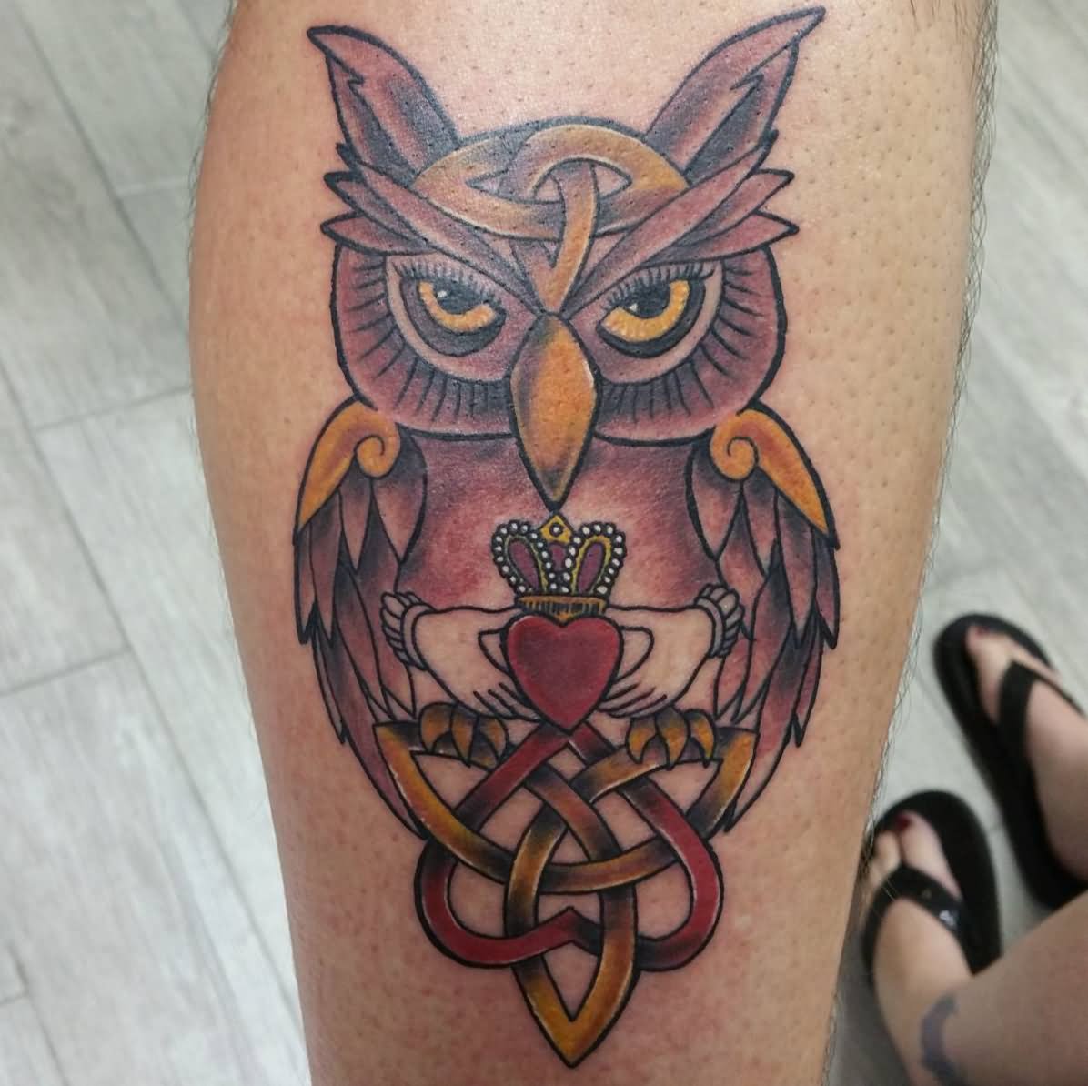 Colorful Celtic Knotwork Owl tattoo On Leg Calf