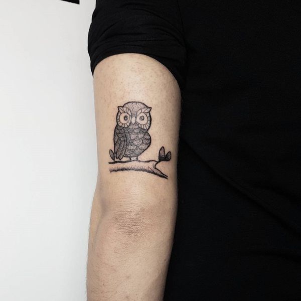 Cute Small Black Ink Barn Owl Tattoo On Back Arm