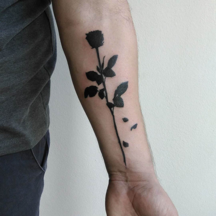 Dark Black Silhouette Rose Tattoo On Forearm