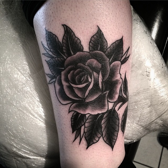 Excellent Black Ink Rose Tattoo Design On Thigh For Girls