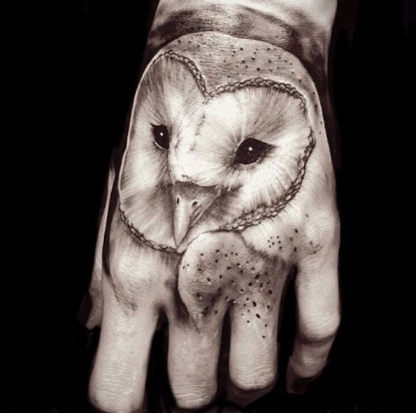 Fantastic White Ink Barn Owl Tattoo On Hand By Greg Sumii