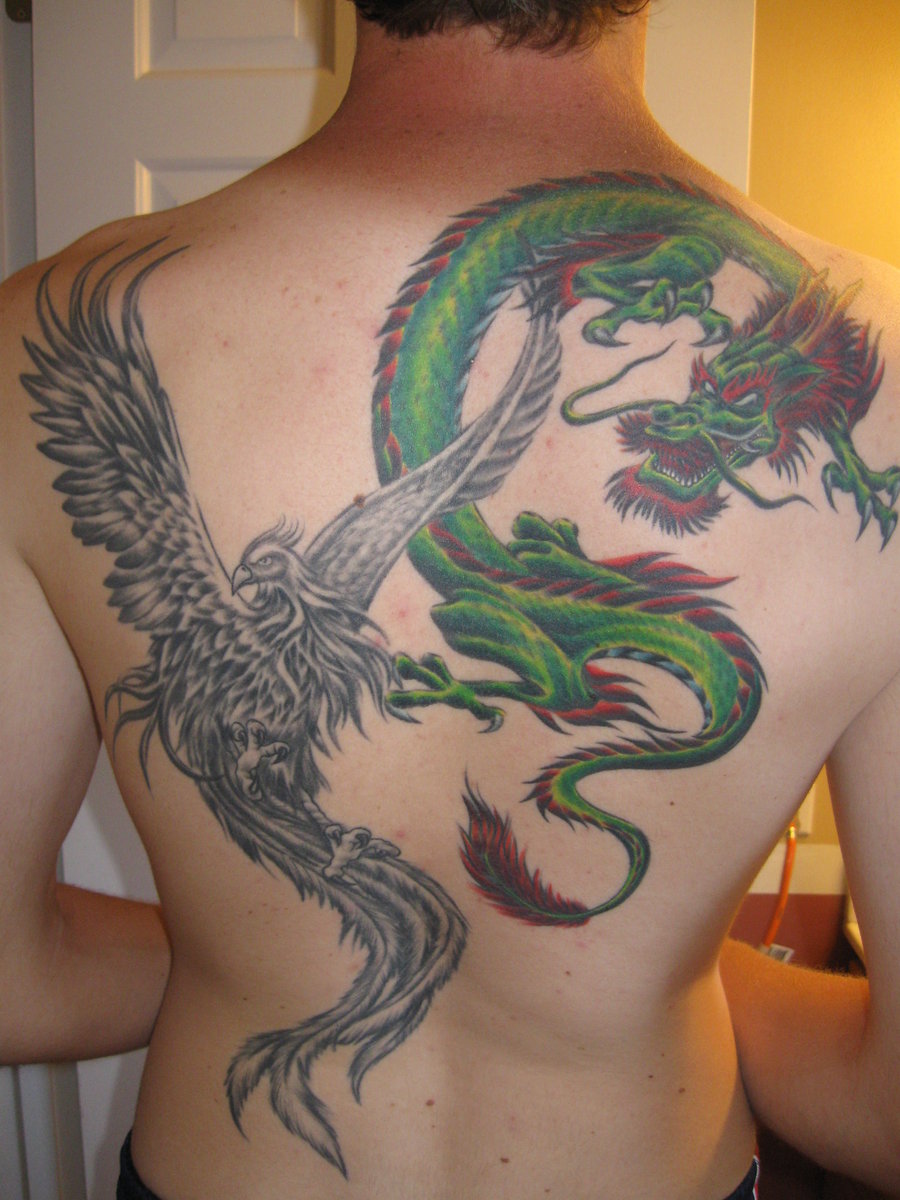 Green Dragon Vs. Grey Ink Phoenix Tattoo On Full Back
