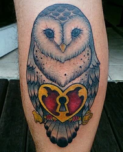 Grey Ink Barn Owl With Heart Shaped Red & Yellow Lock & Key Tattoo On Calf