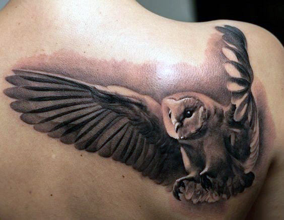 Grey Ink Open Winged Barn Owl Tattoo On Back