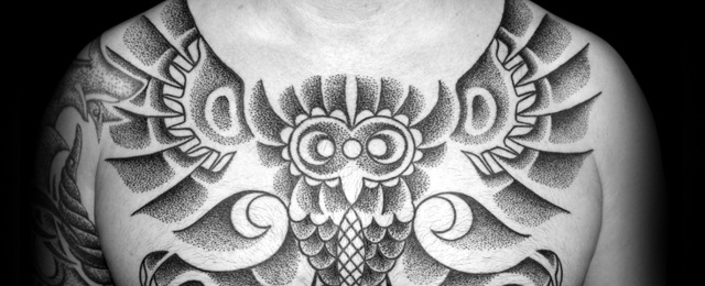 Grey Ink Tribal Owl Tattoo On Chest For Men