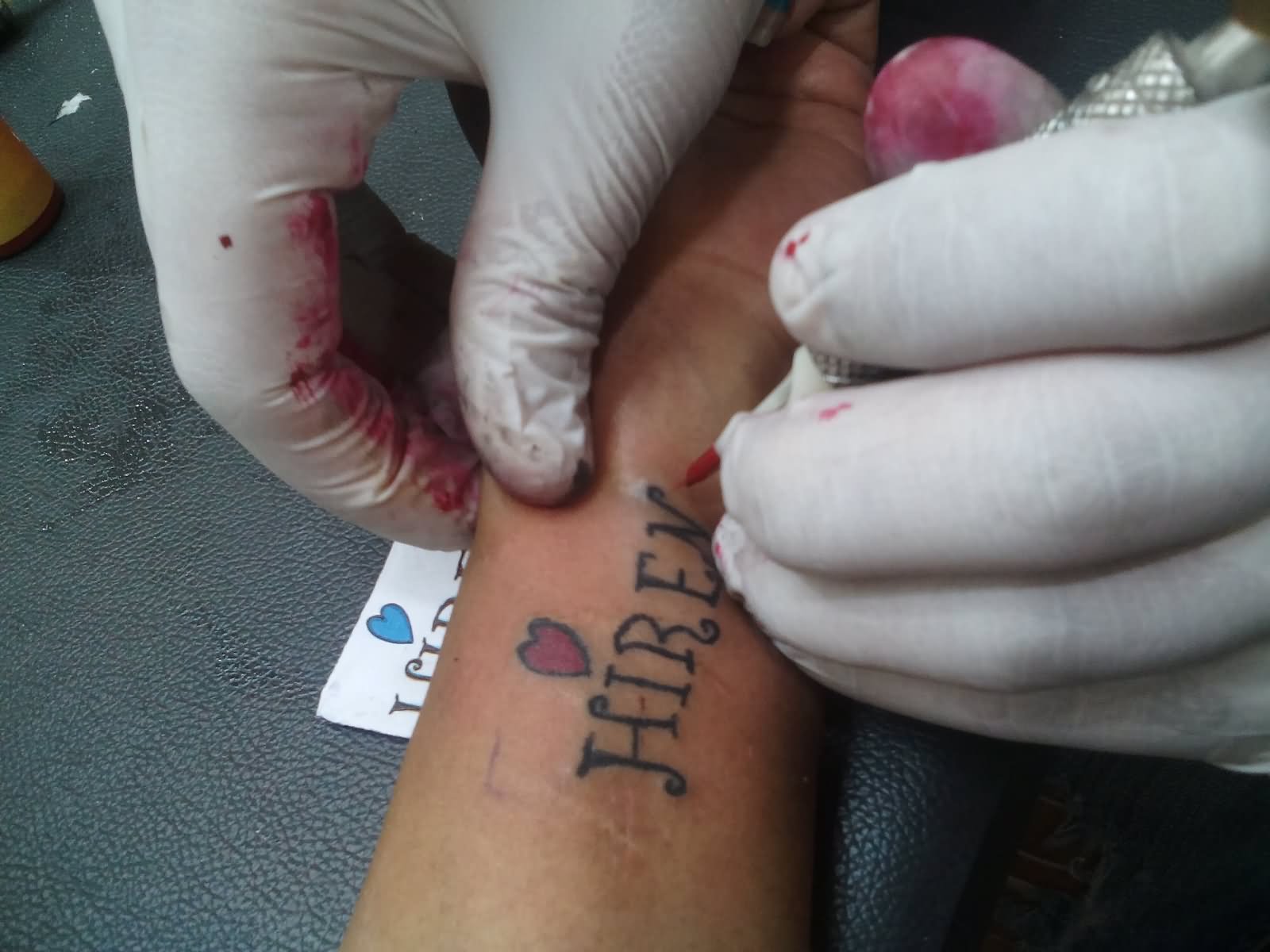 Hiren – Name Tattoo On Forearm