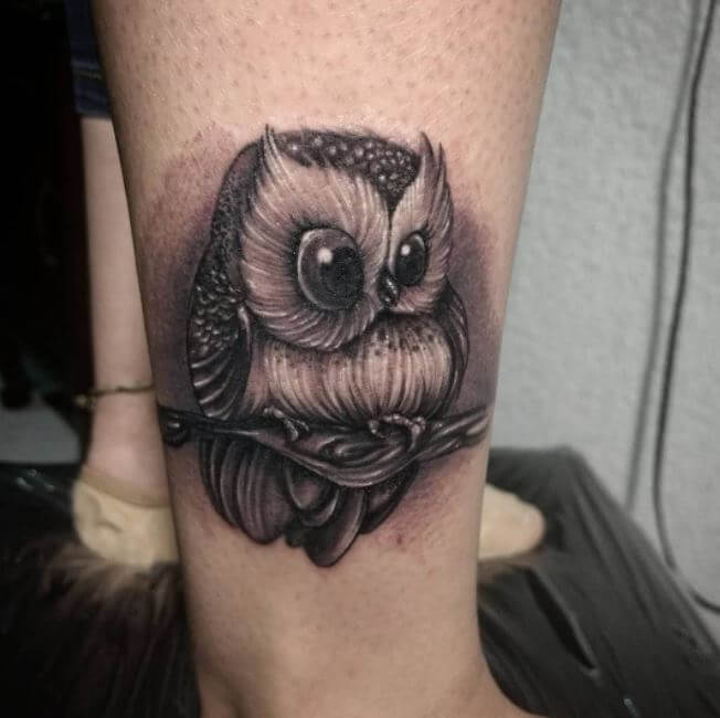 Impressive Grey Ink Cute Baby Owl Tattoo On Leg