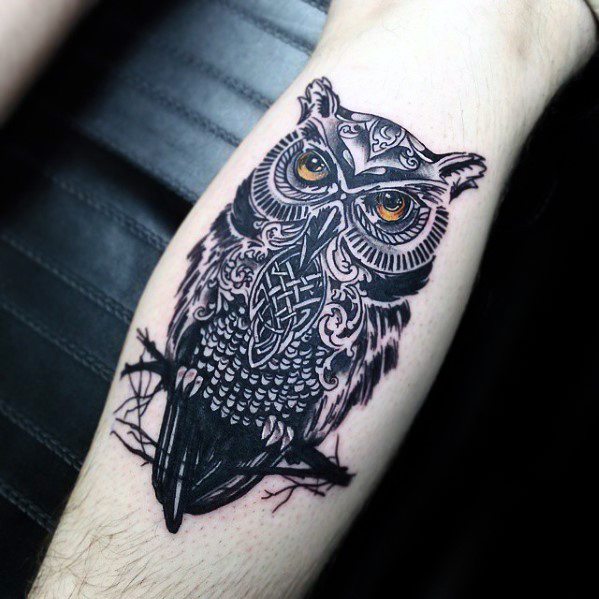 Yellow Eyed Black Ink Owl With Celtic Knots Tattoo On Calf
