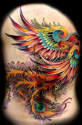 Multi-Colored Flying Phoenix Tattoo On Siderib