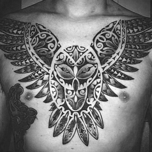 Polynesian Tribal Owl Tattoo Design On Male Chest