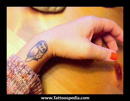 Small Black Outline Baby Owl Tattoo On Wrist