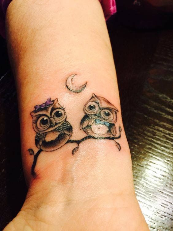 Small Grey Ink Baby Owls Tattoo On Wrist