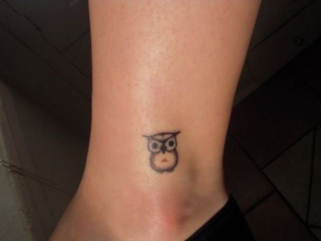 Small Grey Ink Cute Baby Owl Tattoo On Ankle For Girls