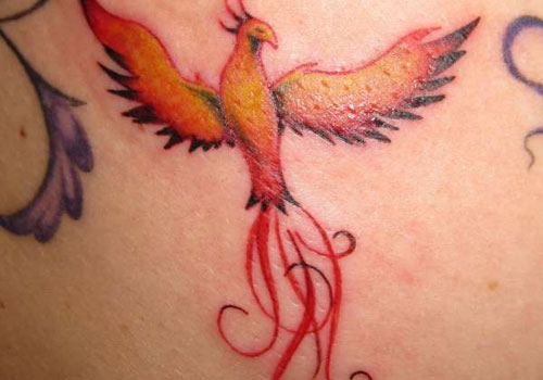 Small Orange Flying Phoenix Tattoo