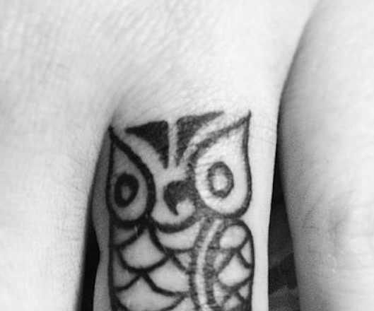 Small Tribal Owl Tattoo On Finger