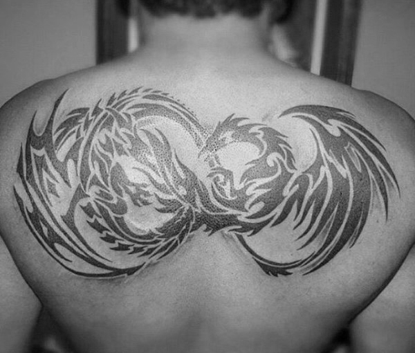 Tribal Phoenix & Dragon Tattoo On Male Upper Back