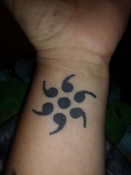 Black Ink Circular Semicolons Tattoo on Wrist