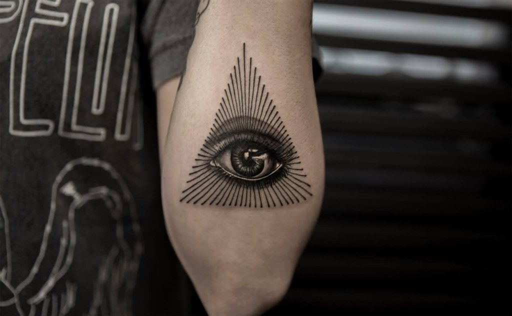 Black Ink Illuminati Sign Tattoo Below Elbow