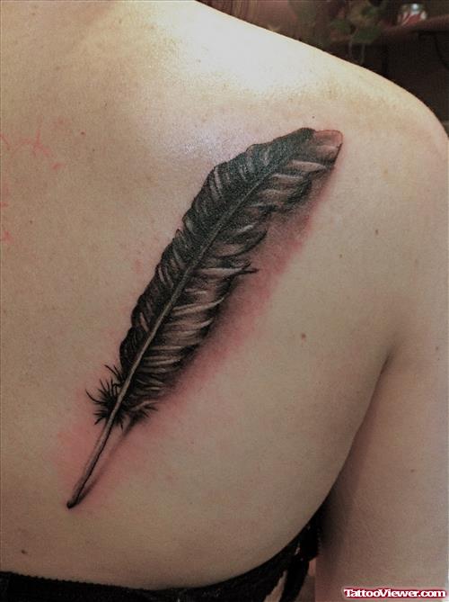 Black Ink Owl Feather Tattoo On Back Shoulder